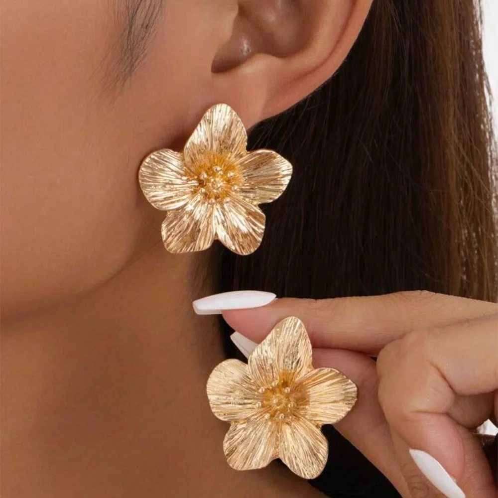 New flower studded earrings